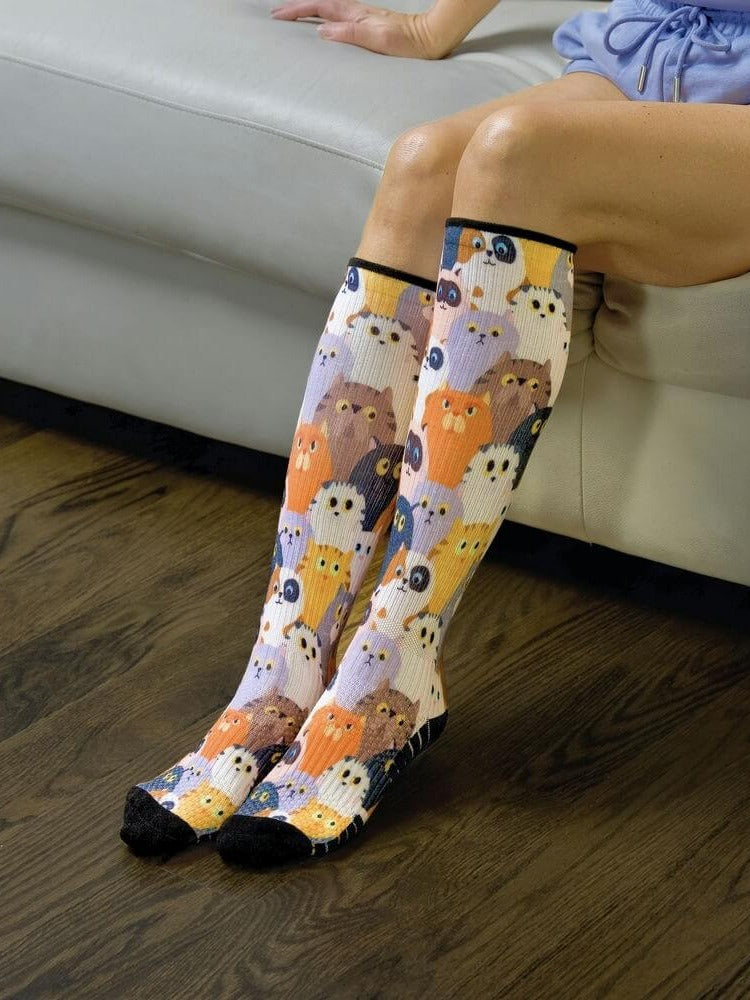 Cat-pattern Compression socks worn while seated